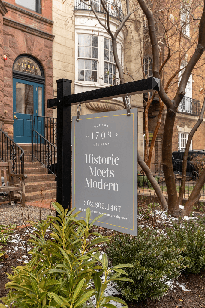 a sign that reads historic meets modern in front of a building